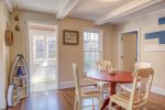 Casual dining area leads out to the sun porch